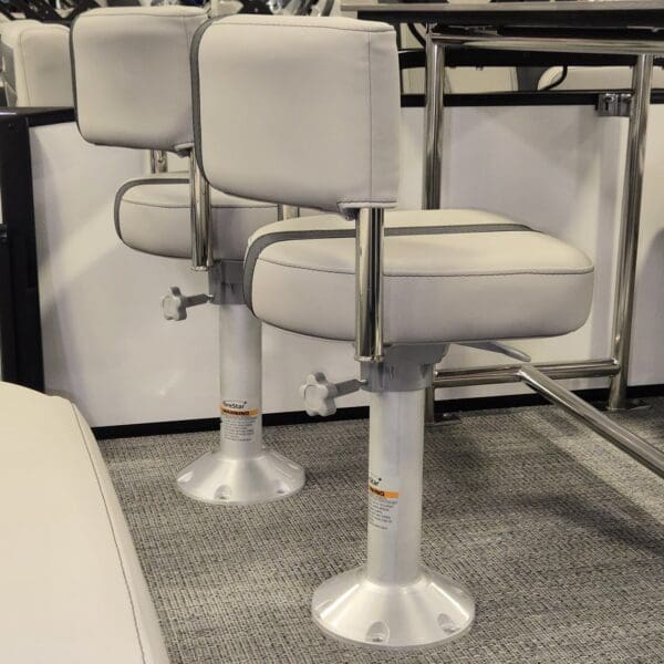 Boat swivel chairs with adjustable height.