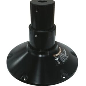 Black mechanical base with warning label.