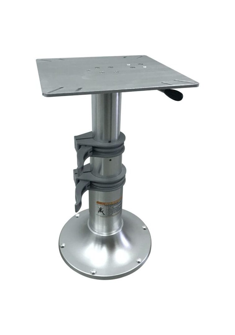 A silver table with a metal base and a black handle.